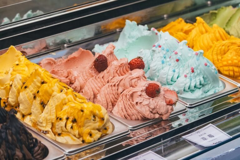 a display case filled with different types of ice cream