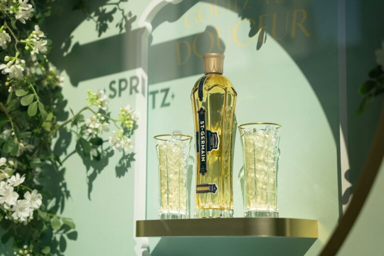 A bottle of perfume sitting on top of a shelf